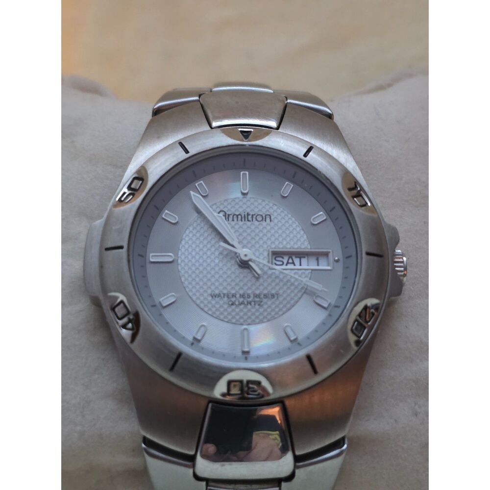 Armitron Men’s Quartz Watch Silver Tone Day Date Textured Dial Case